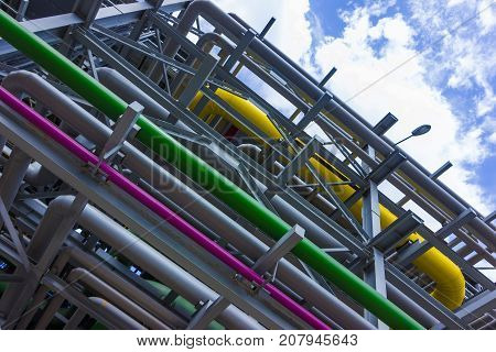 The different colored pipes in the installation of a petrochemical plant