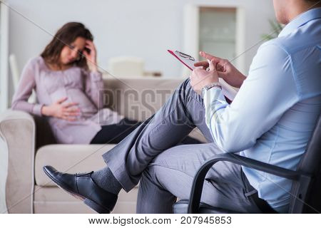 Pregnant woman visiting psychologist doctor