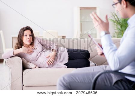 Pregnant woman visiting psychologist doctor