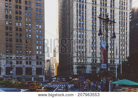 NEW YORK NEW YORK - September 4th 2017: Architecture and beautiful buildings along the streets of Manhattan New York in the City Hall area near Brooklyn Bridge on a sunny late summer day