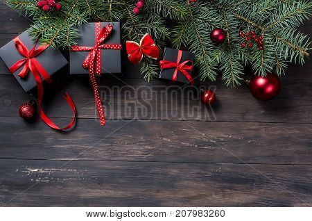 Black Christmas  Gift  Box With Red Ribbon And Fir Branches