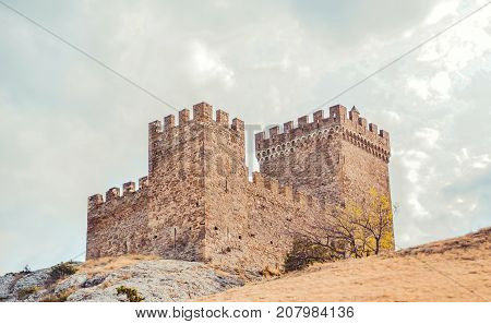 Genoese fortress in Sudak, the Crimea Peninsula, Black sea. Consular castle and the fortification wall of the upper tier. Part of the wall, Museum-reserve 