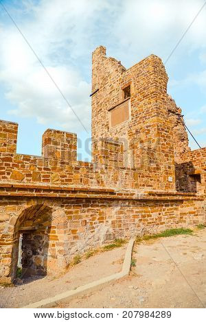 Genoese fortress in Sudak, the Crimea Peninsula, Black sea. Consular castle and the fortification wall of the upper tier. Part of the wall, Museum-reserve 
