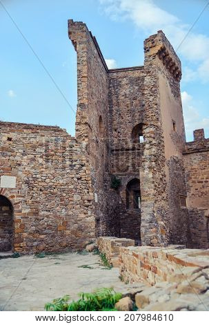 Genoese fortress in Sudak, the Crimea Peninsula, Black sea. Consular castle and the fortification wall of the upper tier. Part of the wall, Museum-reserve 