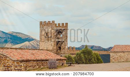 Genoese fortress in Sudak, the Crimea Peninsula, Black sea. Consular castle and the fortification wall of the upper tier. Part of the wall, Museum-reserve 