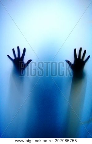 Ghosts On Transparent Background. Paranormal,conceptual Photo Hand On The Glass, Silhouette Through