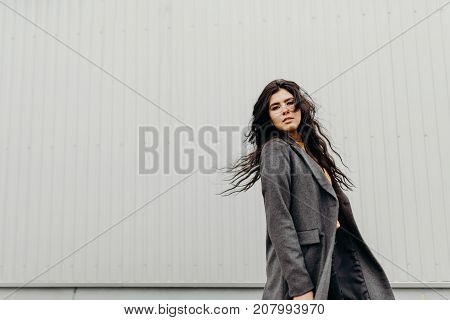 Portrait Of Stylish Modern Young Curly Woman