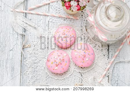 Traditional Easter cupcake with decorations and cupcakes on wooden table