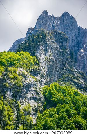 Picturesque Snow-capped Peaks Of High Mountains.