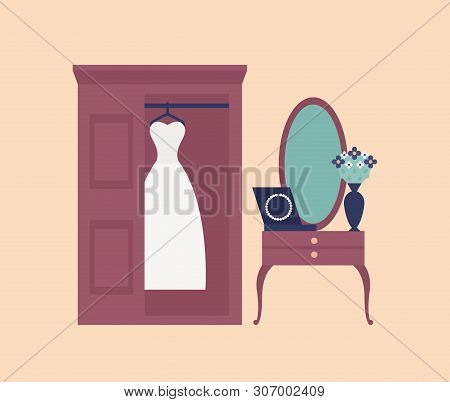 Elegant White Wedding Dress Or Gown Hanging In Wardrobe, Wall Mirror And Dressing Table With Pearl B