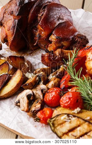 Grilled Pork Knuckle With Grilled Tomatoes, Champignons, Vagetable Marrow, Eggplant, Red Sweet Peppe