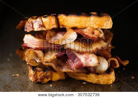 Close Up Of Rustic English Bacon Butty Sandwich