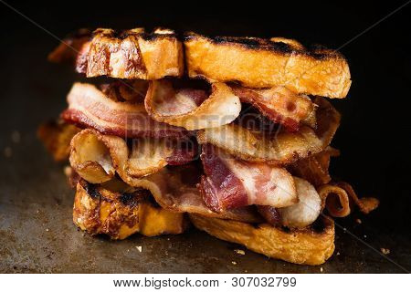 Close Up Of Rustic English Bacon Butty Sandwich