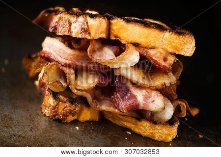 Close Up Of Rustic English Bacon Butty Sandwich
