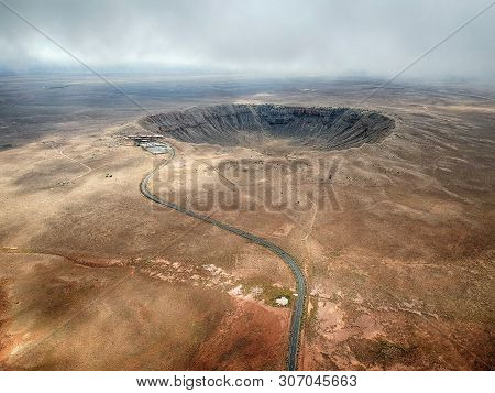 High Angle Aerial Of Meteor Crater, Arizona.
