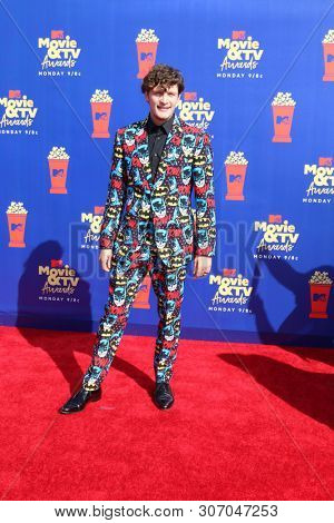 LOS ANGELES - JUN 15:  Brett Dier at the 2019 MTV Movie & TV Awards at the Barker Hanger on June 15, 2019 in Santa Monica, CA