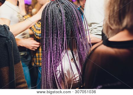 Texture Of Thin Brown Pigtails, Afro Style.