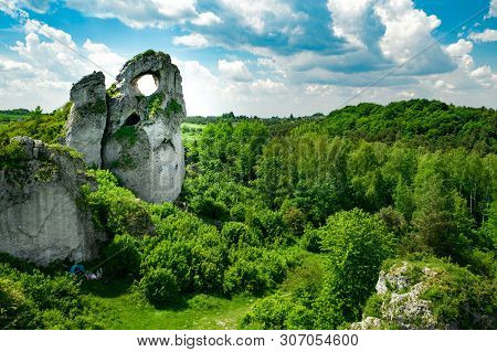 A Panoramic View Of The Unique Okiennik Rock In Poland With A Large Natural Window