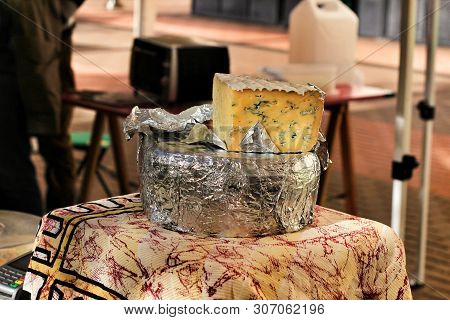 Fresh Cheese For Sale At The Local Ecological Market In The Main Square Of The Raval Neighborhood In