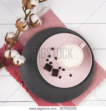 Coffee Latte On The Pink And Gray Pastel Plate With Chocolate And Branch Cotton Wood Background Cora