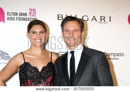 LOS ANGELES - MAR 4: Anna Musky-Goldwyn, Tony Goldwyn at the 2018 Elton John AIDS Foundation Oscar Viewing Party at the West Hollywood Park on March 4, 2018 in West Hollywood, CA