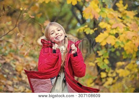 Feel So Cozy In Warm Jacket. Girl Happy In Coat Enjoy Fall Nature Park. Child Wear Fashionable Coat 