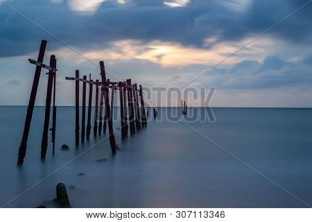 Broken Wooden Fisfing Bridge During Sunset At Khao Pilai In Phang Nga, Southern Of Thailand