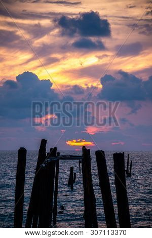 Broken Wooden Fisfing Bridge During Sunset At Khao Pilai In Phang Nga, Southern Of Thailand