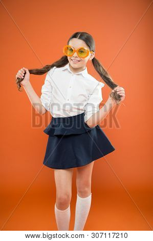 I Am A Girl And I Am Smart. Little Smart Schoolgirl On Orange Background. Adorable Child With Smart 
