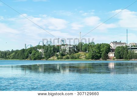 Helsinki, Finland - June 12, 2019: Toolo Bay In City Park, Helsinki, Finland. Across The Water, Ride