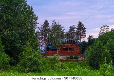 landscape with the image of russian north village Ferapontovo in Vologda region