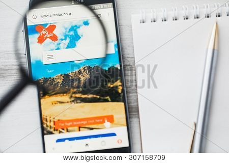 Los Angeles, California, Usa - 9 June 2019: Airasia X Berhad Official Website Homepage Under Magnify