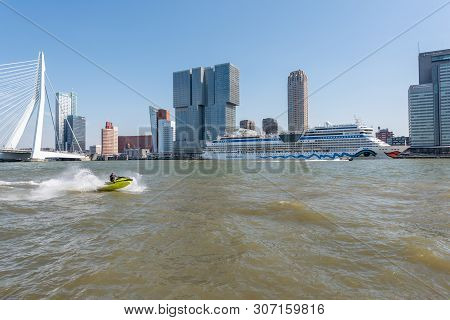 Rotterdam, Netherlands - April 18, 2019 : Jet Ski On The Nieuwe Maas River With Aidamar Cruise Ship 