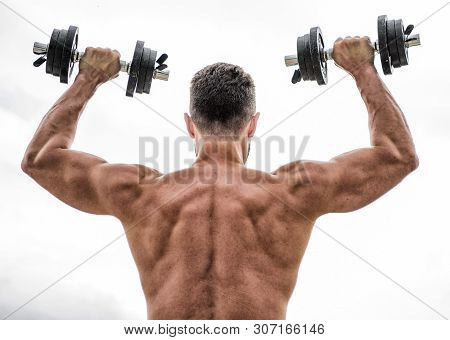 Muscular Back Man Exercising In Morning With Barbell. Fitness And Sport Equipment. Man Sportsman Wei