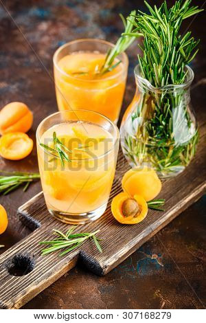 Summer Drinks, Rosemary Aprcot Cocktails With Ice In Glasses. Refreshing Summer Homemade Alcoholic O