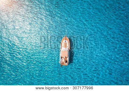 Aerial View Of Luxury Yacht In Transparent Blue Sea At Sunset In Summer In Mallorca, Spain. Colorful