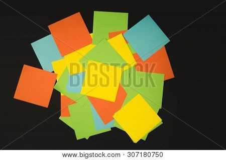 Different Color Paper Stickers With Pins Isolated On Black Background.