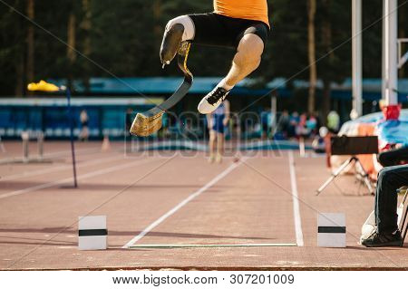 Athlete Amputee On Prosthetic Leg Long Jump Competition At Athletics
