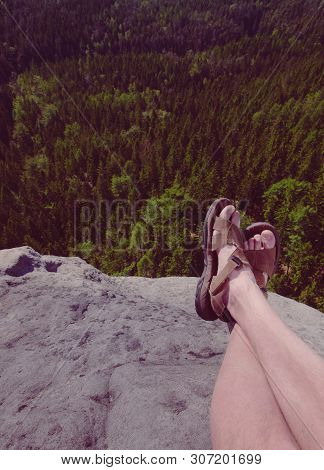 Resting Legs Within Mountain Running Trail. Hiker Watching Hilly Landscape Over Own Hairy Legs.