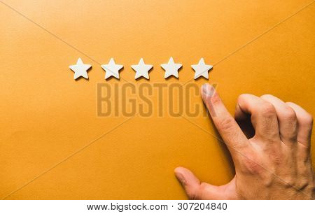 Five White Stars On An Orange Background