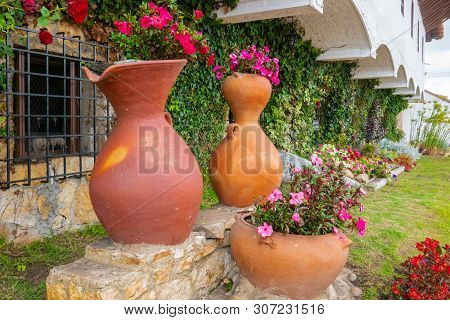 Guatavita,  Colombia June 16 Garden With Decorative Clay Pots Located In Front Of The City Hall In T