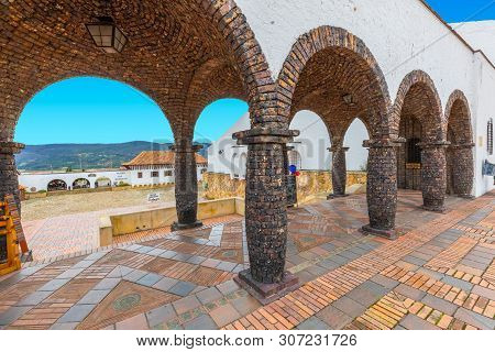 Guatavita,  Colombia June 16 Ancient Stone Porch In The Historic Center Of Guatavita. This Village W