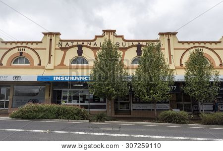 Tenterfield, Australia - April 12, 2019: Beautiful Facade Of A 1914 Building With Rendered Parapet A