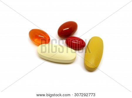 Assorted Supplement Pills Isolated On White Background