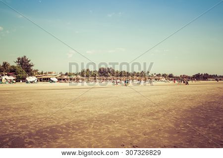 Goa, India - December 20, 2018: View Of The Morjim Beach. Beach Life