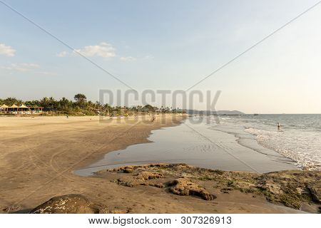 Goa, India - December 20, 2018: View Of The Morjim Beach. Beach Life