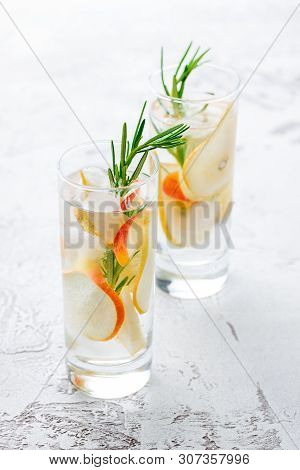 Summer Drinks, Rosemary Pear Cocktails With Ice In Glasses. Refreshing Summer Homemade Alcoholic Or 