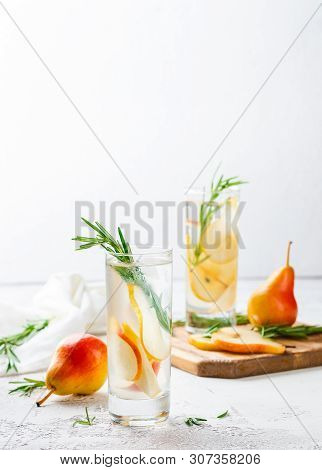 Summer Drinks, Rosemary Pear Cocktails With Ice In Glasses. Refreshing Summer Homemade Alcoholic Or 