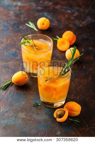 Summer Drinks, Rosemary Aprcot Cocktails With Ice In Glasses. Refreshing Summer Homemade Alcoholic O