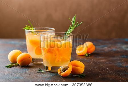 Summer Drinks, Rosemary Aprcot Cocktails With Ice In Glasses. Refreshing Summer Homemade Alcoholic O